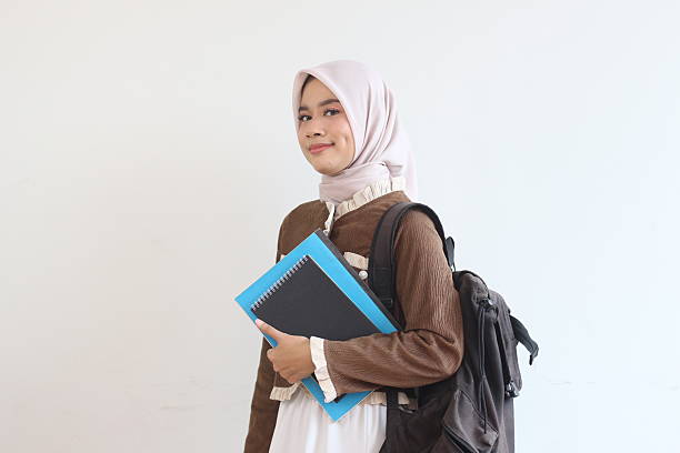 istock Confident Muslim Student Girl with Backpack and Books Ready for Class 2190006289