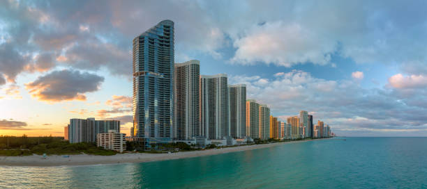 istock Expensive highrise hotels and condos over sandy beachfront on Atlantic ocean shore in Sunny Isles Beach city at sunset. American tourism infrastructure in southern Florida 2190008115