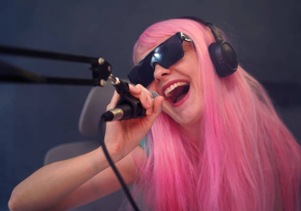 Beautiful young singer and modern musician broadcast from her home studio.