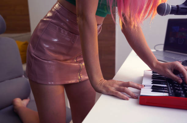 Blond woman showing headphone jack