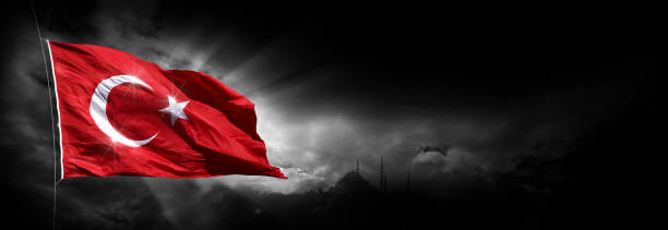 istock The waving Turkish flag and istanbul with the dark clouds 2190011521