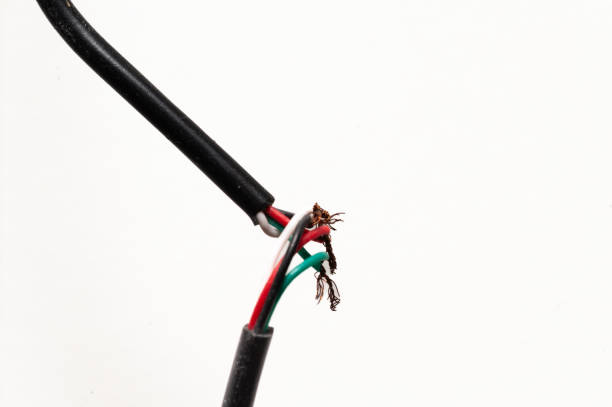 istock A wire is cut in half and has a green, red, and black color 2190012150