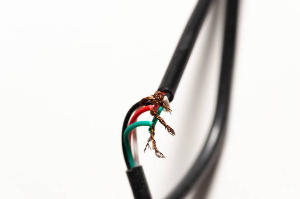 istock A wire is cut in half and has a green, red, and black color 2190012270