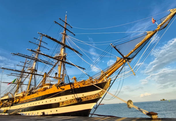 istock A large old ship at pier under a beautiful blue sky 2190014516