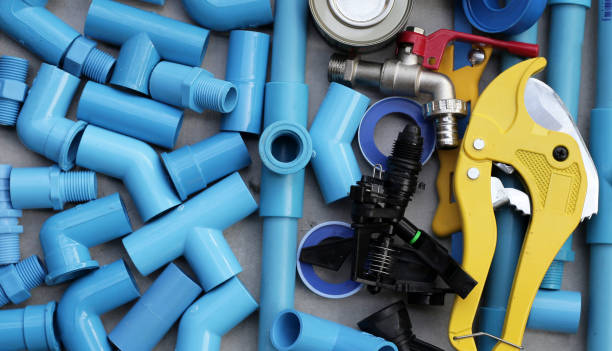 istock Plumber equipment with blue pvc pipe connections for plumbing work. 2190014573