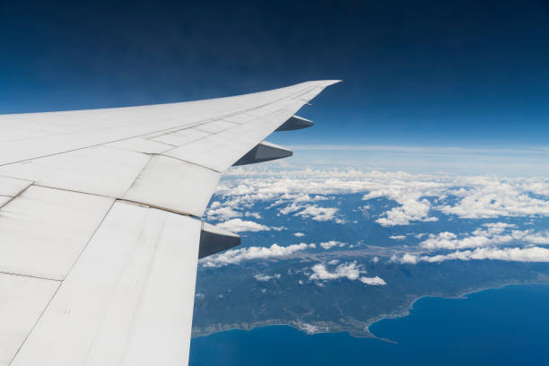 istock View of blue sky and white clouds during the flight. 2190015455