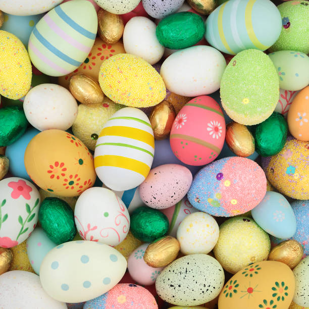 istock Symbols of Easter Beautiful Decorated Eggs Background 2190021296