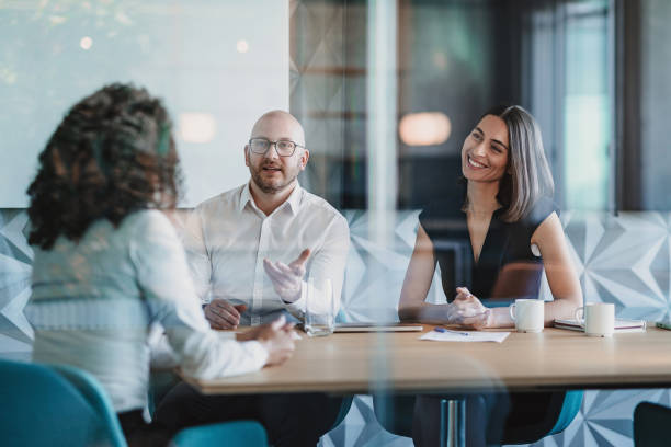 istock Small group of entrepreneurs having a meeting 2190024085