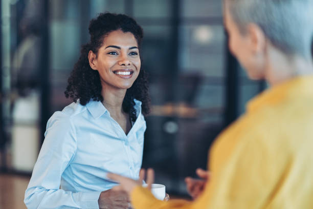 istock Smiling young businesswoman concentrated in a conversation 2190024091