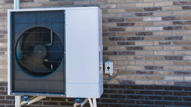 istock air source heat pump unit installed outdoors at a modern home with solar panels in the Netherlands 2190024331