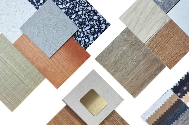 istock palette of interior material samples in top view contains wooden tiles, artificial stone, terrazzo, gold stainless, drapery, laminated isolated on background with clipping path. 2190025059