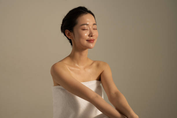 istock Beautiful young woman sweating at the spa 2190025830