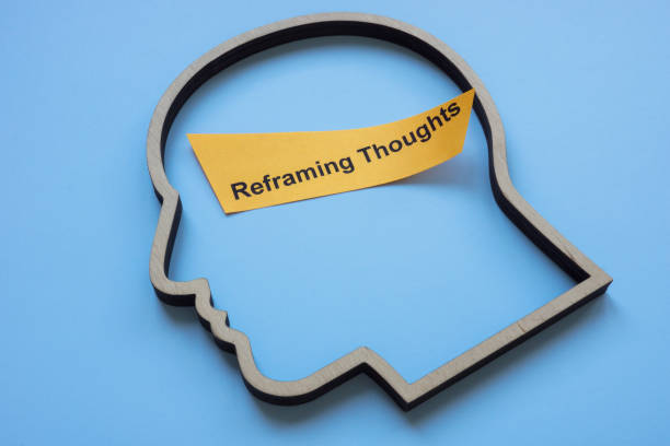 istock Outline of a head with the phrase reframing thoughts. Mindset shift and cognitive transformation. 2190026108