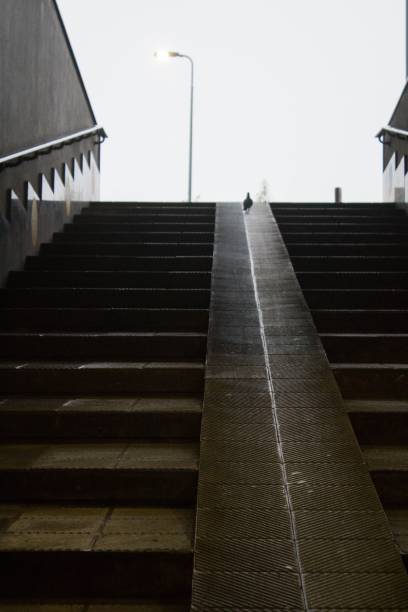 istock Milan, Italy - December 23, 2021: MM Rogoredo Station, Metro exit stairs 2190027580