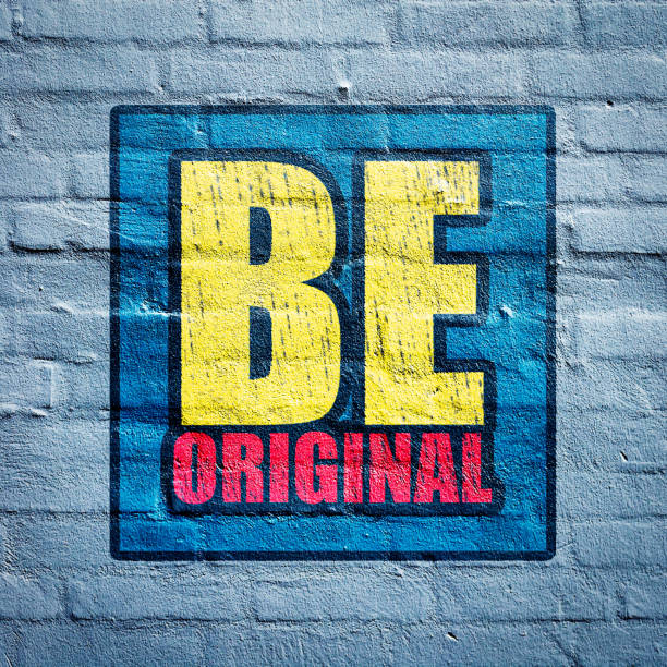 A colorful sign that says Life gets better together. The sign is made up of different colors and is placed on a brick wall