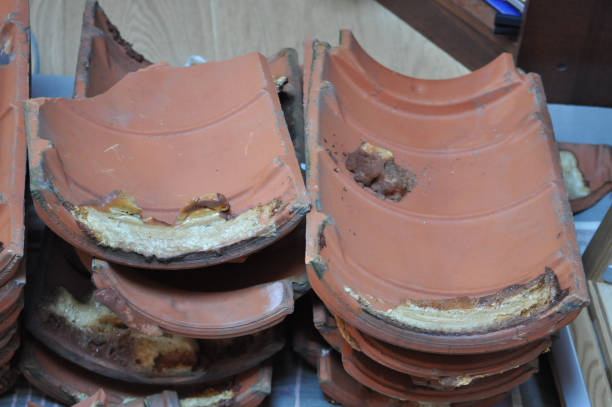 istock disposed roof tile pile in construction site 2190028646