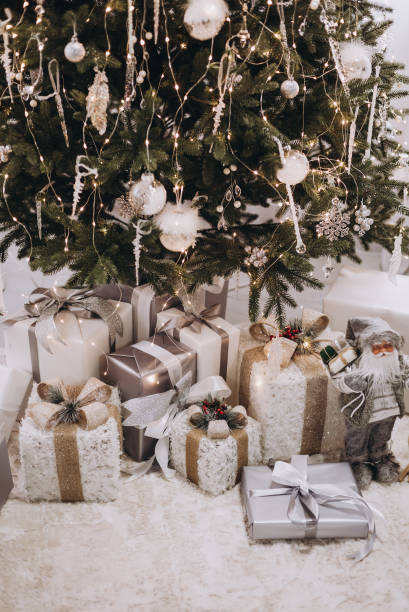 istock Presents under a christmas tree in the festive morning 2190033059
