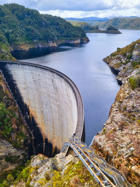 istock Gordon Dam in Tasmania, an impressive concrete structure surrounded by rugged cliffs and a lake in a remote wilderness 2190034209