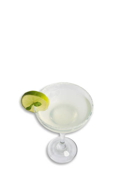 istock Classic cocktail served in a glass with lime garnish on white background 2190034384