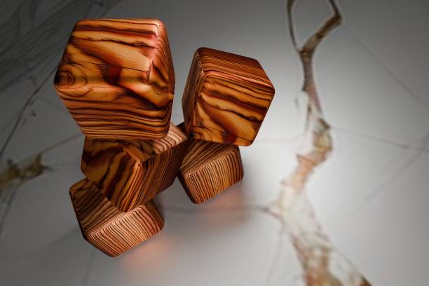 istock Wooden cubes with intricate grain patterns stacked on a marble surface, creating a visually appealing contrast between natural textures and smooth stone 2190040725