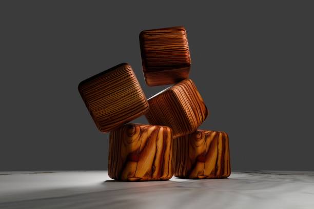 istock Stack of wooden cubes with intricate grain patterns, artistically balanced against a dark background, showcasing natural textures and craftsmanship 2190040726