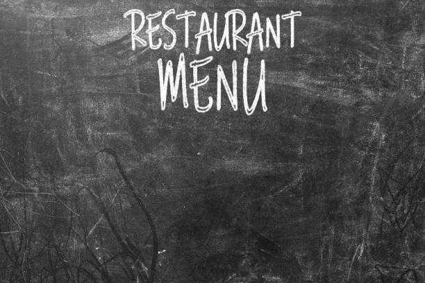 Business strategies and goals or New Year and Merry Christmas written on a school chalkboard or blackboard.