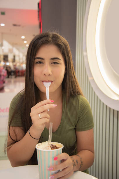 istock Beauty woman drinking milk-shake 2190042520