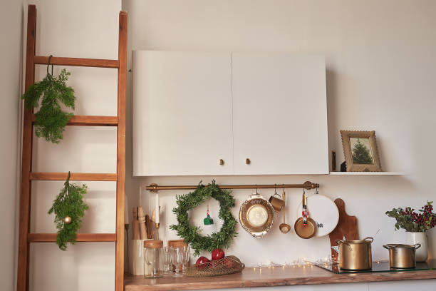 istock Christmas kitchen and table. Red, green and white decor christmas tree background. New Year celebration. Merry Christmas and Happy New Year. 2190043009
