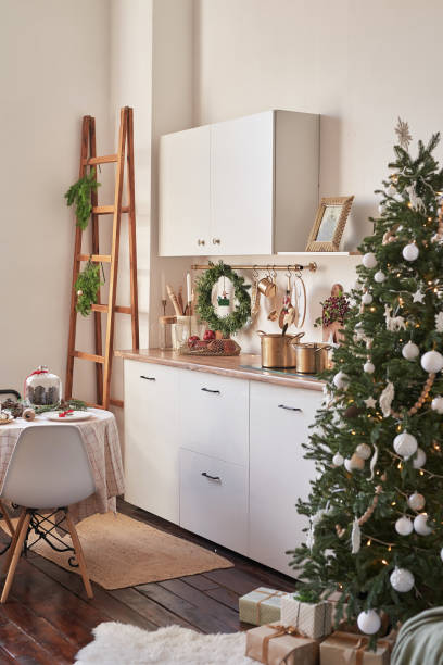istock Christmas kitchen and table. Red, green and white decor christmas tree background. New Year celebration. Merry Christmas and Happy New Year. 2190043257