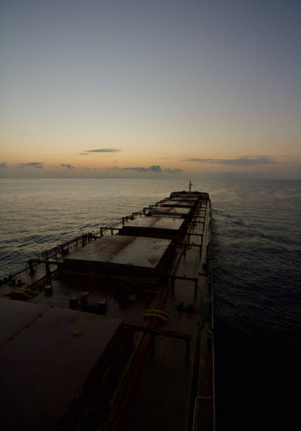 istock A merchant ship underway at sea during Sun rise 2190043263