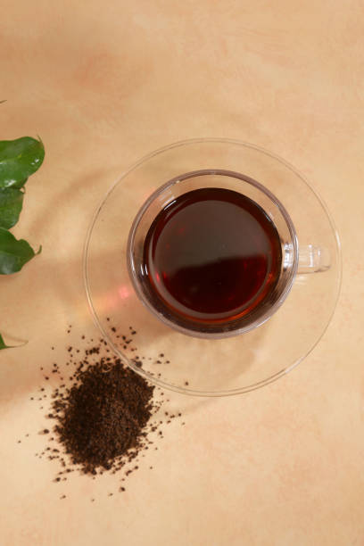 Glass of herbal tea isolated on white background with clipping path. Double Wall Glass Cup with tea. Copy space.