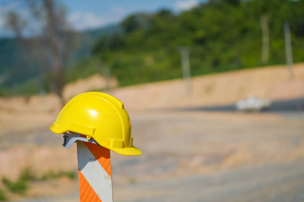 The engineer's safety helmet is removed and placed during the brake.