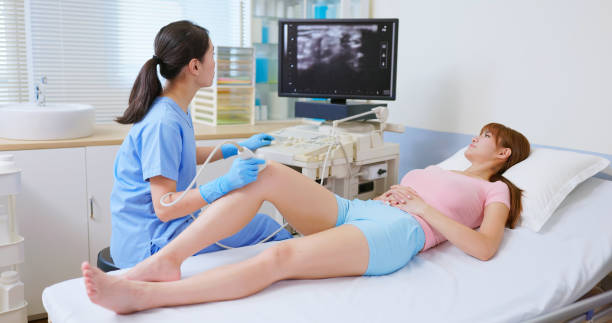 istock young female knee injury ultrasound 2190052559