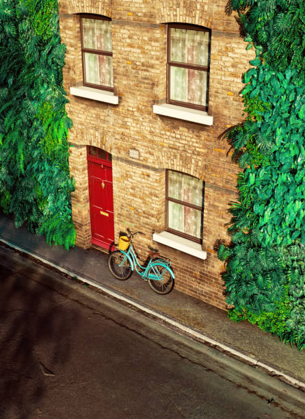 Beautiful brick building with a bold red door at the center, framed by lush green foliage on both sides. Above the door, two windows with curtains add symmetry. A vintage turquoise bicycle with a basket leans against the wall, adding a pop of color and charm to the peaceful urban setting. The vibrant greenery contrasts elegantly with the warm brickwork, creating a harmonious balance between nature and architecture.