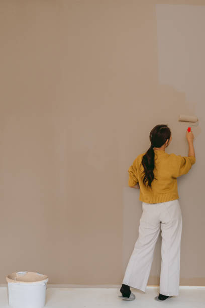 DIY: A woman's painting her own apartment