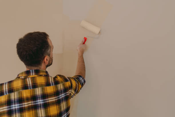 istock DIY: A man's painting his own apartment 2190057669
