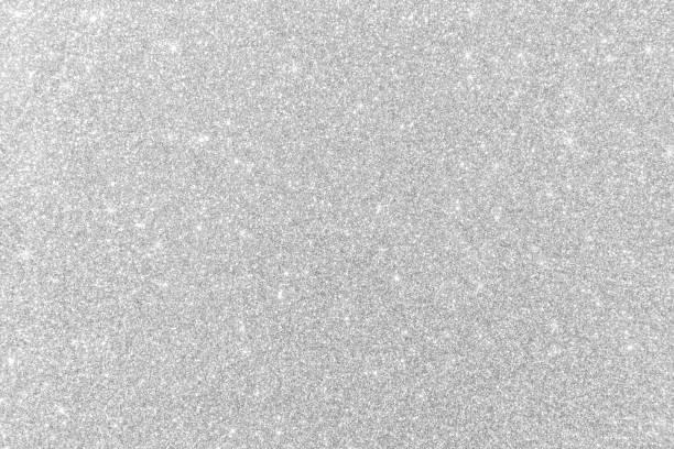istock Silver glitter background texture white sparkling shiny wrapping paper for Christmas holiday seasonal wallpaper decoration, greeting and wedding invitation card design element 2190060507