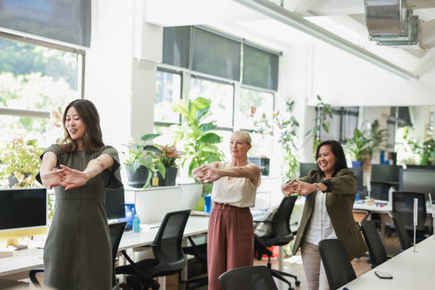 istock Business woman stretching while on an active break at a creative office 2190063703