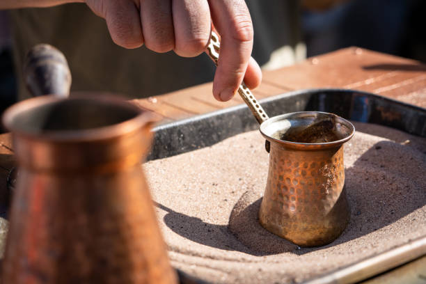 istock Turkish coffee. Person preparing Turkish coffee. 2190064243