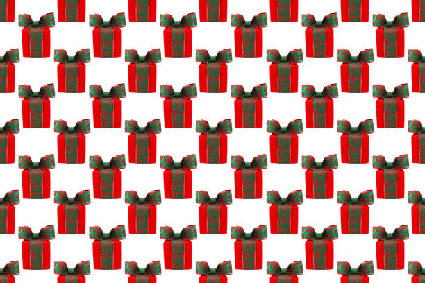 Seamless pattern of red gift boxes on a white background. New Year and Christmas background.