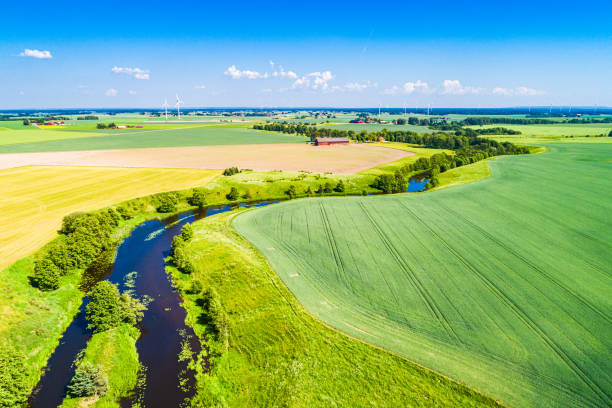 istock River Flowing Through Lush Green Swedish Countryside 2190070609
