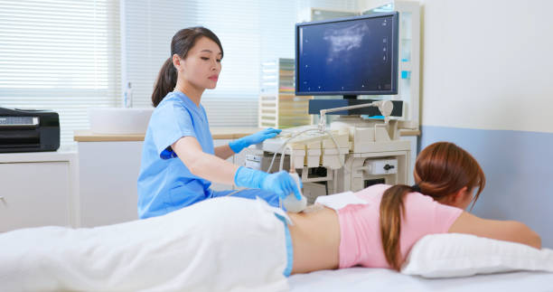 istock female waist injury ultrasound 2190072012