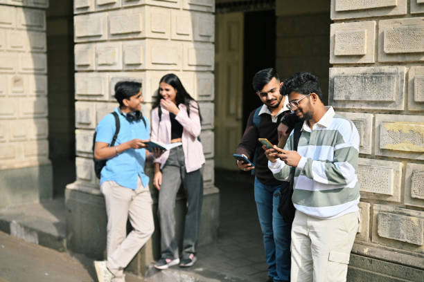istock Group of University students chatting and having fun in the campus 2190074942