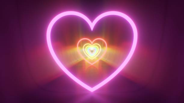 istock Endless Corridor Reflecting Rainbow Neon Heart Shaped Glowing Tunnel - Abstract Background Texture 2190077280