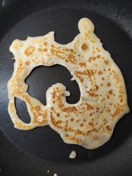 istock Pancake flatbread twisted in the shape of a snail and spiral 2190077392