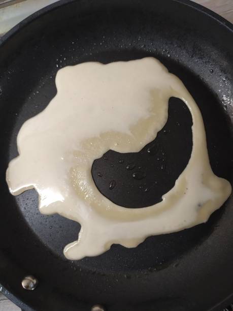 istock Unbaked batter for a pancake of a funny shape 2190077394