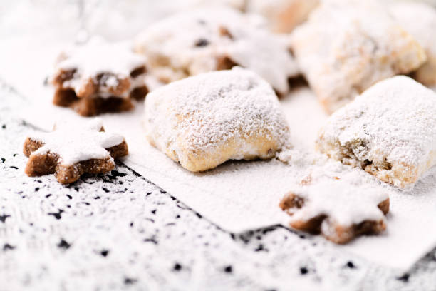 istock Christmas cookies (cinnamon stars) on bright background. Soft focus. Close up 2190078769