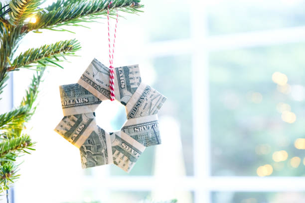 Close up of Moneygami  (Money Origami) Christmas Wreath folded from US dollar bills