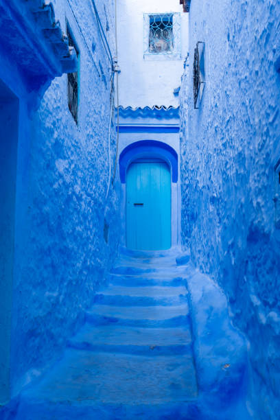 istock Blue colored houses and steps in Chefchaouen, Morocco. 2190090904