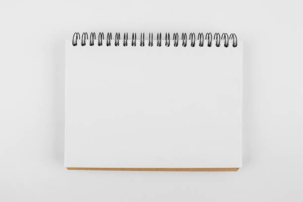 istock Close-up photo of a blank white notepad on a white background. Template, place for your text, copy space 2190091048